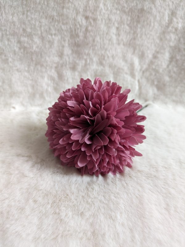 Pompón rosa empolvado